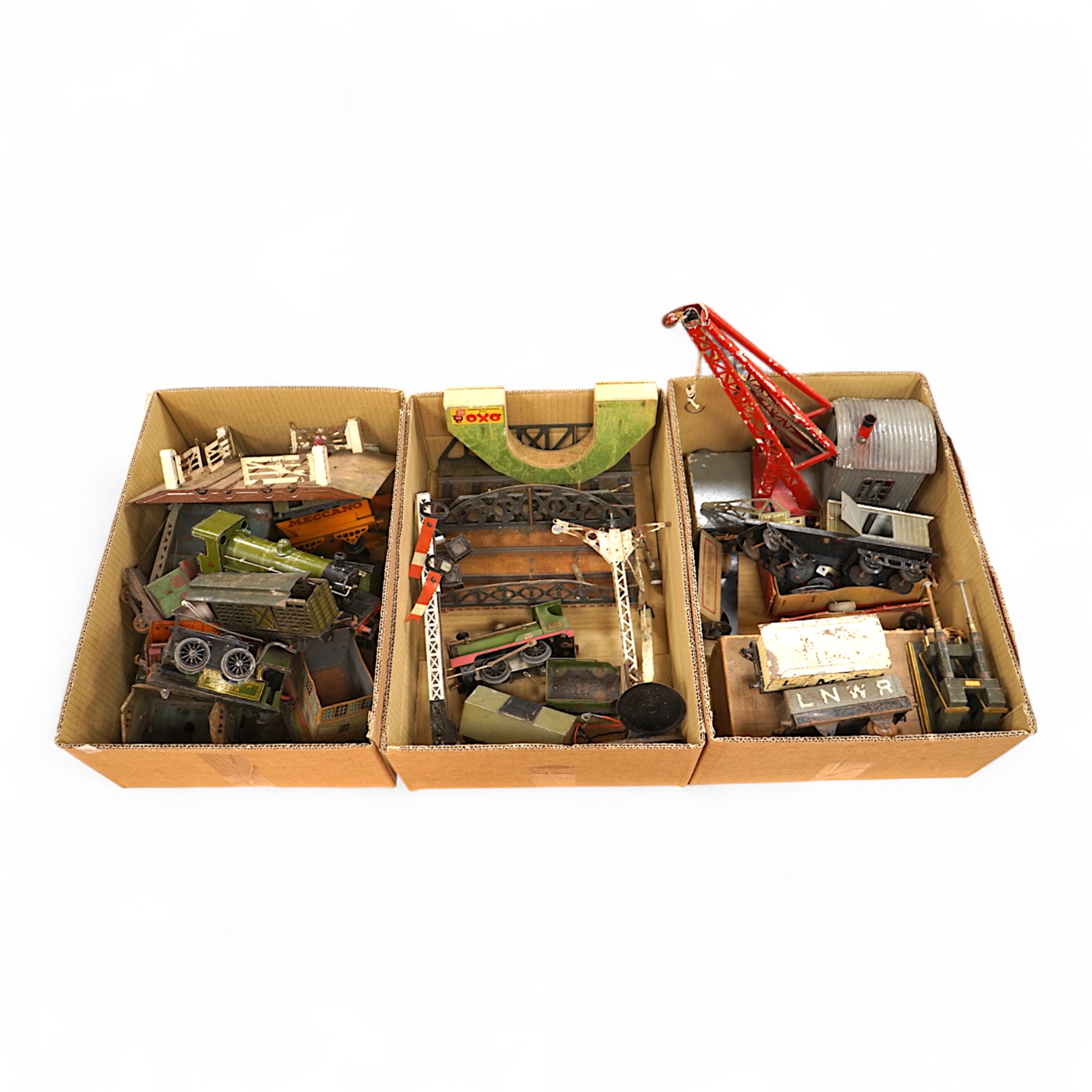 A Bing for Bassett Lowke 0 gauge tinplate clockwork LNER Ivatt 4-4-0 tender locomotive, 4390, together with an early Hornby clockwork 0-4-0, 2710, in GNR green livery with Meccano Ltd roundels to locomotive splasher and